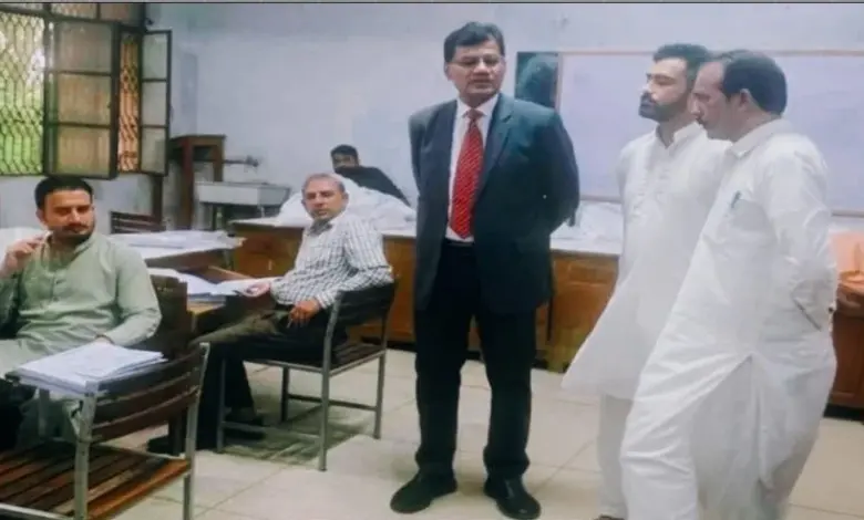 Chairman BISE Rawalpindi Prof Dr Iqbal Mahmood visiting the Jhelum marking centre
