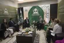TRNC Minister Oğuzhan Hasipoğlu addressing the OIC ministerial conference in Islamabad