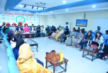PIO Reesa Adil addressing women journalists at the National Press Club Islamabad