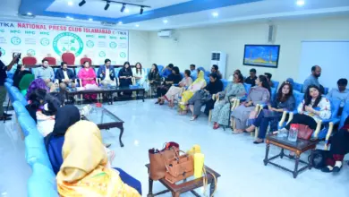 PIO Reesa Adil addressing women journalists at the National Press Club Islamabad