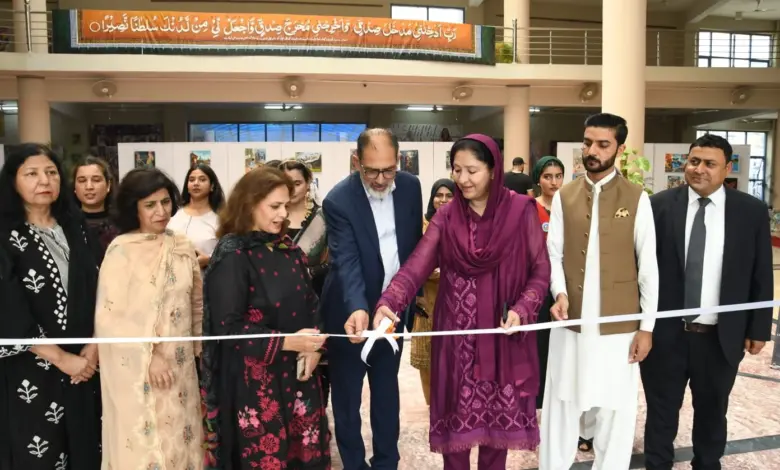 Young artists display paintings on the Kashmir issue at Conflict Through Art competition in Islamabad