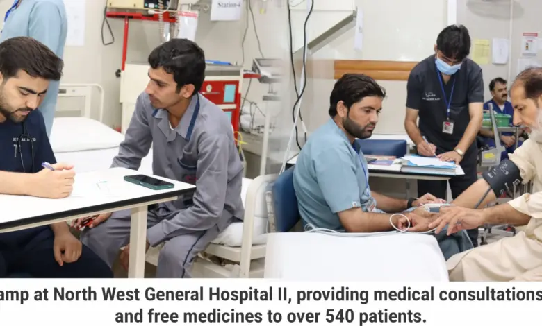Patients receiving healthcare services at a free medical camp at Northwest General Hospital II