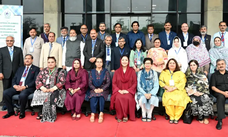 Wajiha Qamar with vice chancellors and senior officials at HEC leadership workshop