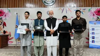 Prof Shahid Mahmood Abbasi presenting awards to SSC high achievers at IMCB I-8/3 Islamabad