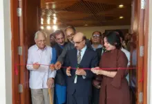 Visitors viewing artworks at Kashmir art exhibition at PNCA Islamabad