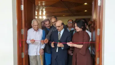 Visitors viewing artworks at Kashmir art exhibition at PNCA Islamabad