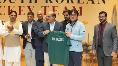 PFF officials hosting the South Korean hockey team at a luncheon in Islamabad