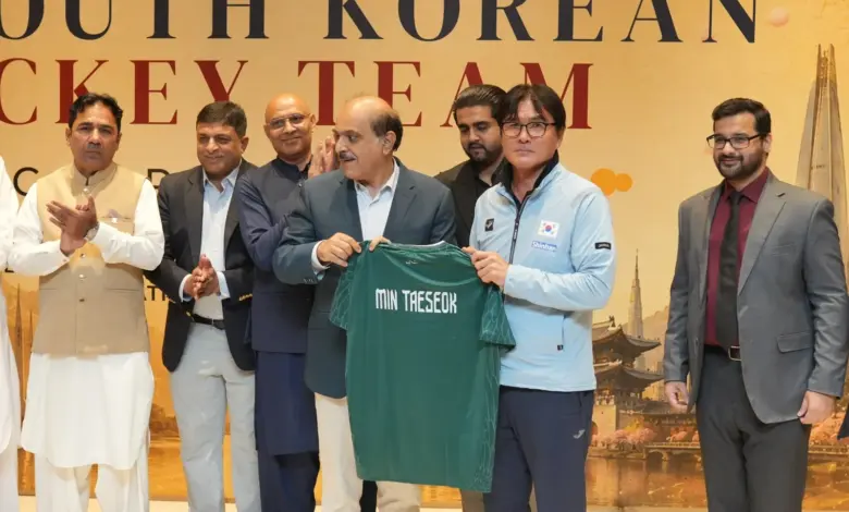 PFF officials hosting the South Korean hockey team at a luncheon in Islamabad