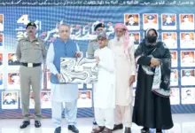 Abdul Aleem Khan and IG Motorway Police Sultan Ahmad Chaudhry at the martyrs memorial