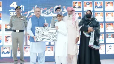 Abdul Aleem Khan and IG Motorway Police Sultan Ahmad Chaudhry at the martyrs memorial