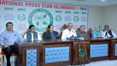 Shahid Khaqan Abbasi addressing a press conference at the National Press Club Islamabad