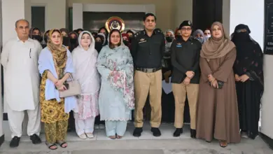 Women University Mardan students receiving certificates at District Police Mardan