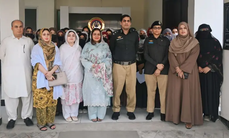 Women University Mardan students receiving certificates at District Police Mardan
