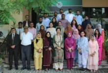 Faculty members attending NAHE AI literacy training through HEC Smart Classroom