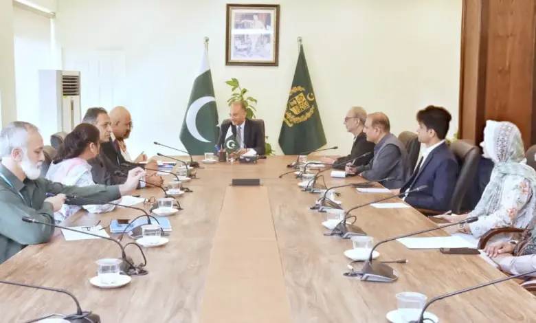 Dr Musadik Malik meeting UN-Habitat officer Oddy Angelo in Islamabad