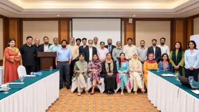 Textile and energy sector stakeholders attending a policy dialogue in Faisalabad