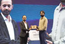 Participants presenting AI solutions at Alibaba Cloud AI Hackathon in Karachi