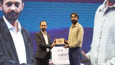 Participants presenting AI solutions at Alibaba Cloud AI Hackathon in Karachi