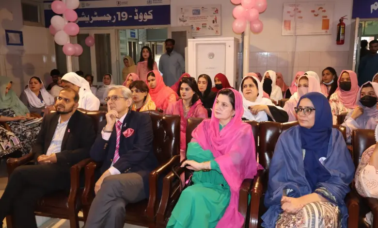 District Health Officer Islamabad addressing a breast cancer awareness session