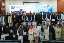 Executive Director HEC Dr Zia Ul Haq presents certificate to an official after SAP S/4HANA training
