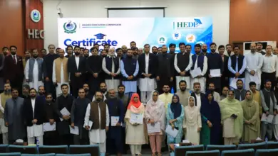 Executive Director HEC Dr Zia Ul Haq presents certificate to an official after SAP S/4HANA training
