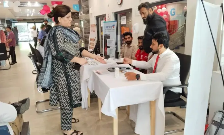 People receiving blood pressure checks at a health screening camp in Pakistan
