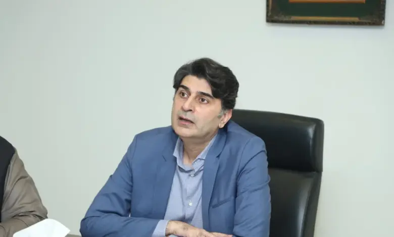 Dr Mukhtar Bharath chairing a meeting on kinnow and citrus fruit exports