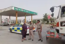 Motorway Police personnel providing assistance and road safety guidance to travellers