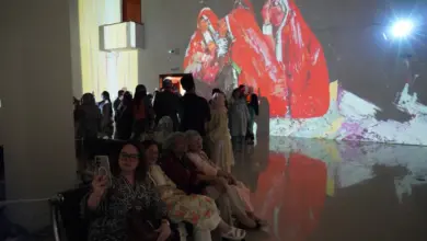 Visitors view NusratJi’s solo exhibition at the National Art Gallery Islamabad