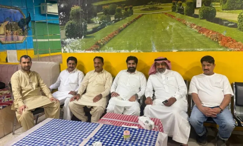 Raja Awais Minhas with guests at his son’s aqeeqah reception in Jubail